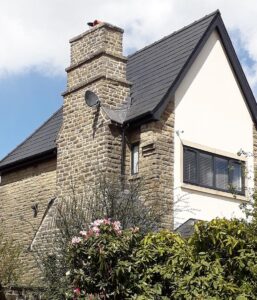gable end view of house showing restored chimney