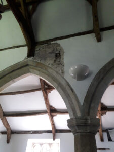 damage to internal church wall
