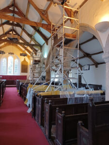 inside church with scaffold tower